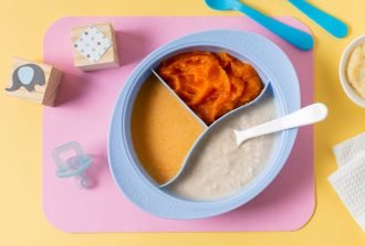 flat-lay-baby-food-with-spoon